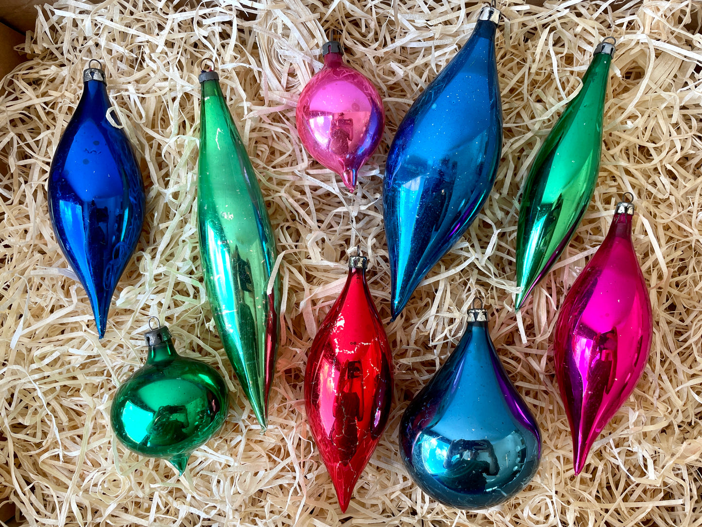 Nine vintage droplet shaped glass baubles