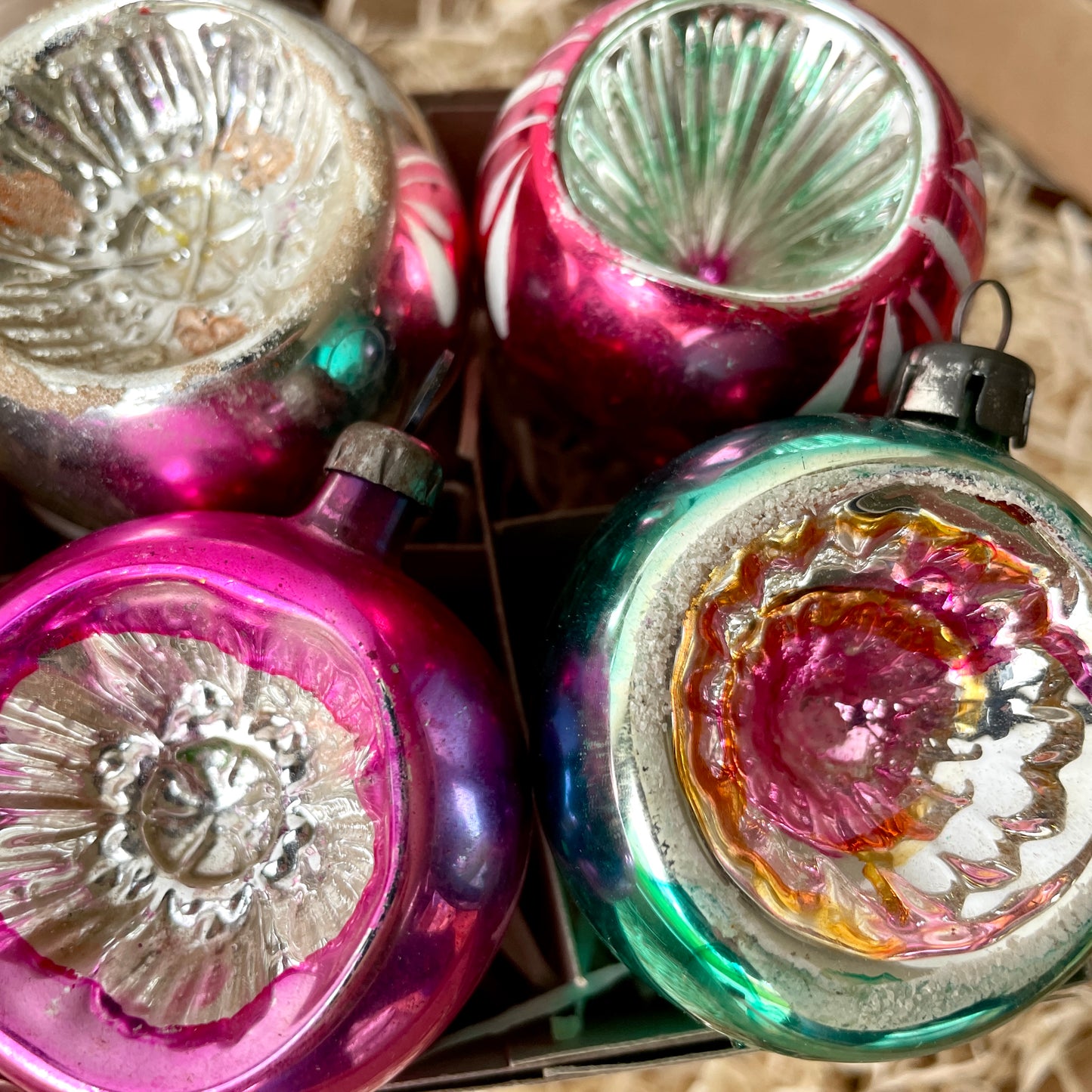 Six early concaved glass baubles