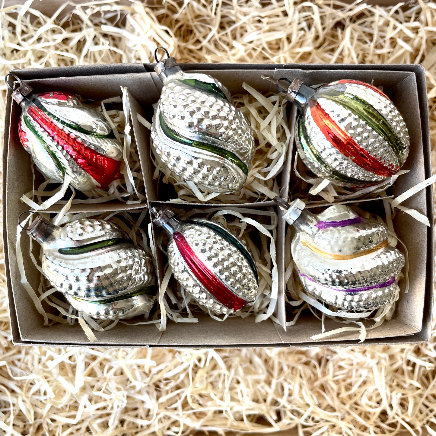 Six vintage twist and stipple shaped glass baubles