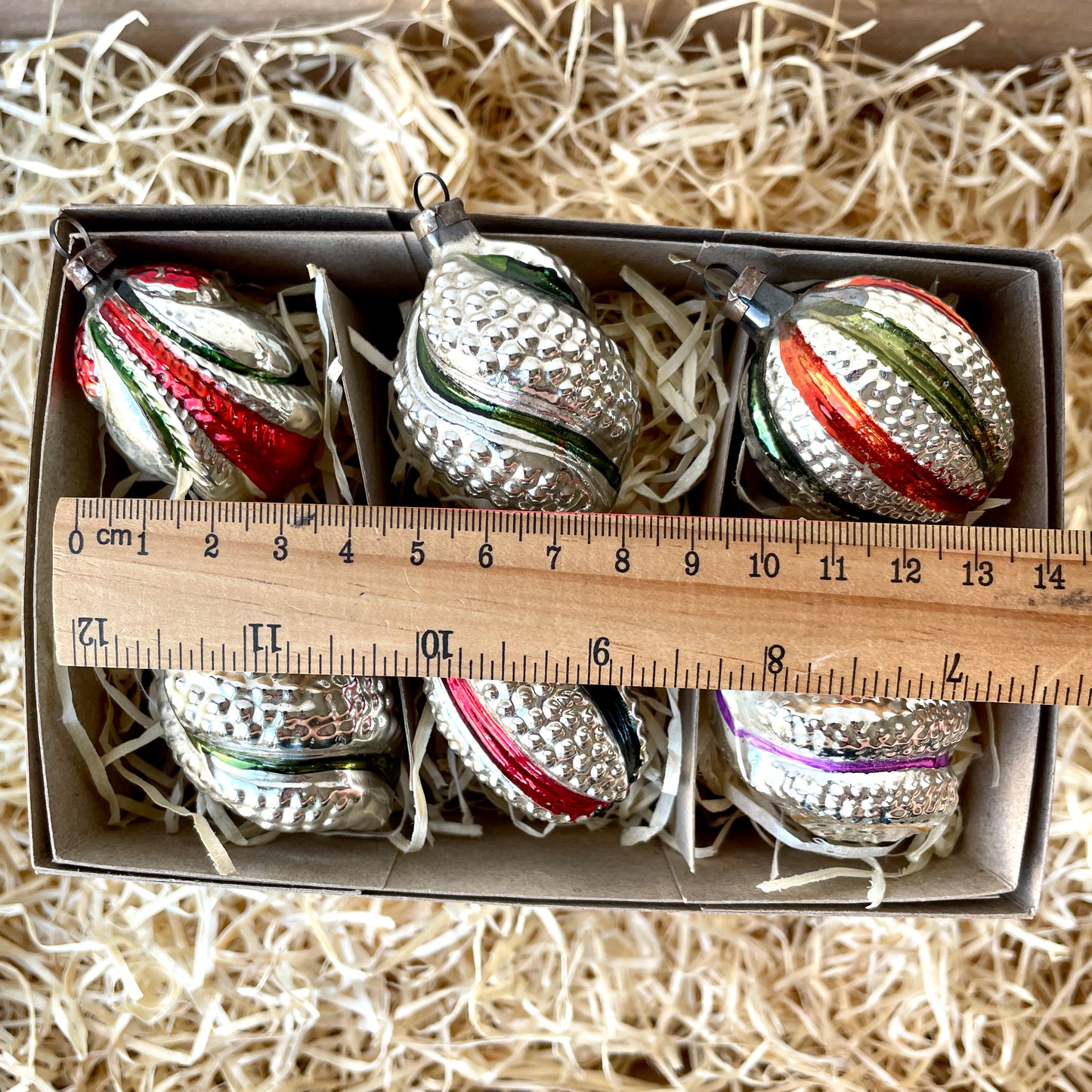 Six vintage twist and stipple shaped glass baubles