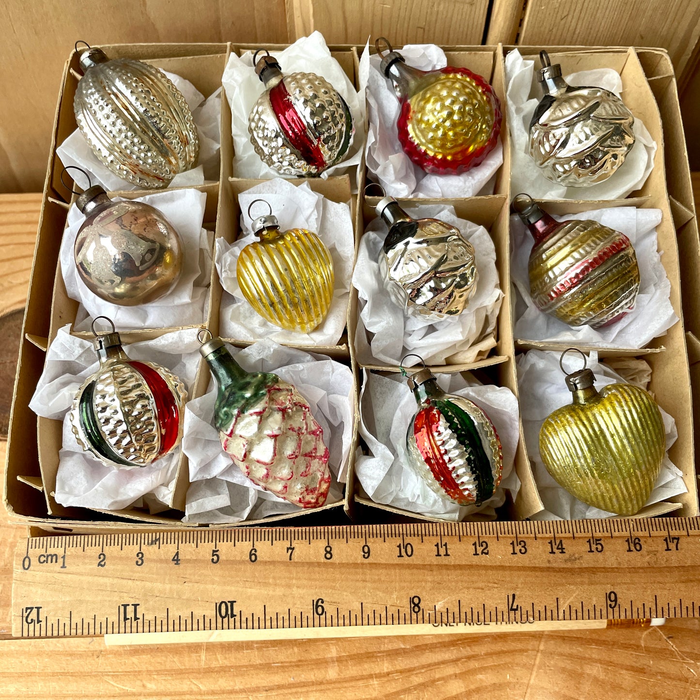 Twelve early vintage baubles