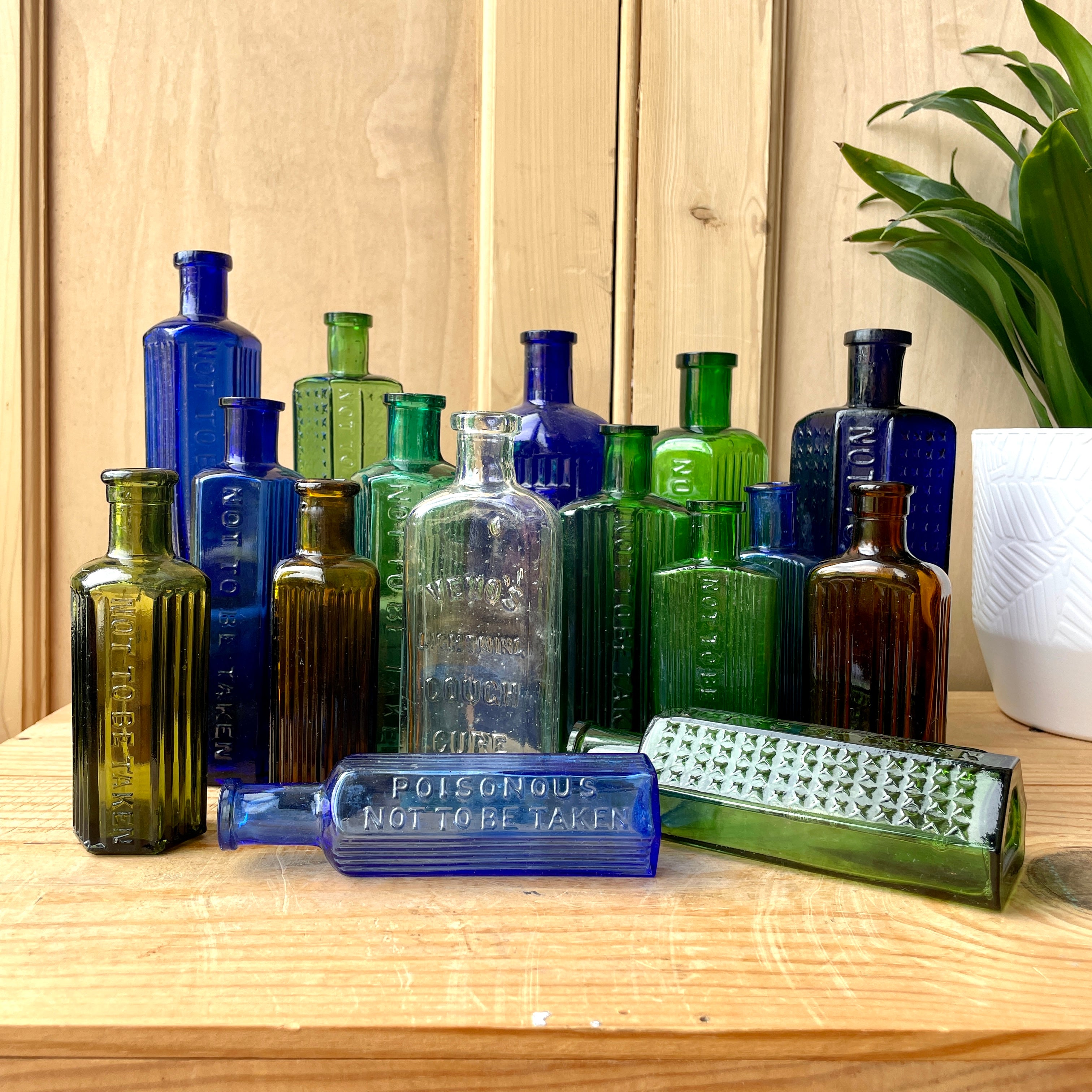 Hot Six Blue-Green Early-Century Antique Bottles